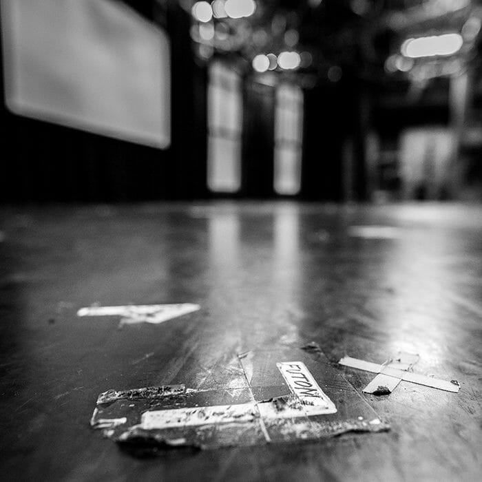 A black and white photo of an empty stage.