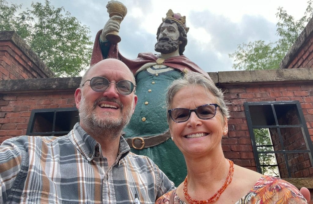 Donor Spotlight: Bridget and Brian Schleppi capturing a selfie with a statue.